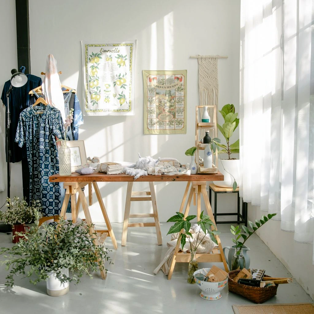 A quiet Standard Queen room with botanical artwork and a triple-pane window.